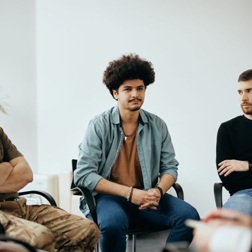 young-muslim-man-attending-group-therapy-at-mental-2023-11-27-05-16-29-utc young-muslim-man-attending-group-therapy-at-mental-2023-11-27-05-16-29-utc